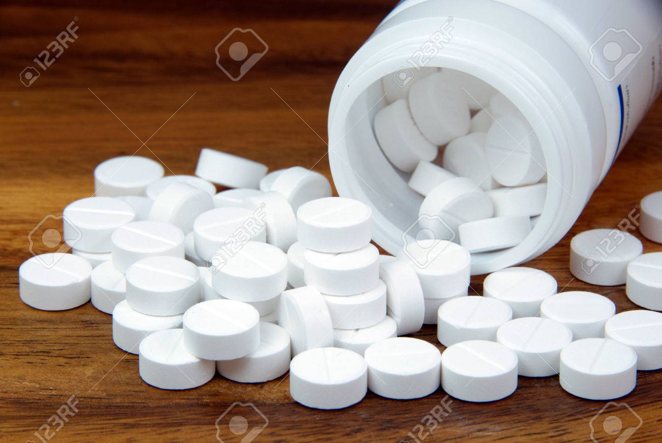 Oral medicine, pills paracetamol,white