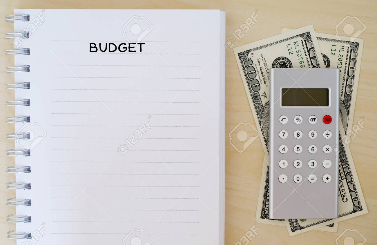 budget background note book money and calculator financial budget money calculator