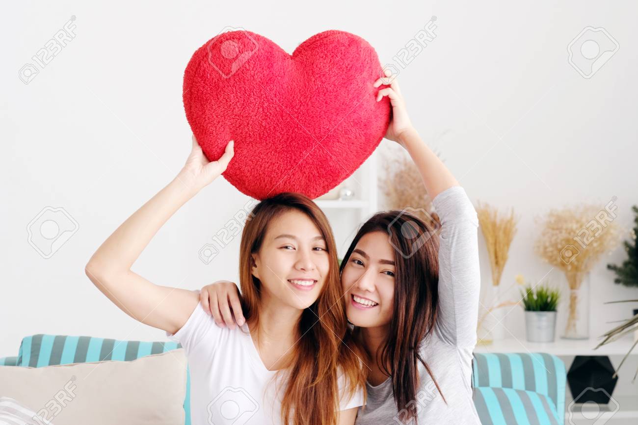Stock Photo Young Cute Asia Lesbians Holding Red Heart Shape Willow Together Smiling With Happiness At Home Lgbt Couple Lesbians Valentines Day Stock Photo Young Cute Asia Lesbians Holding Red Heart Shape Willow Together Smiling With Happiness At Home Lgbt Couple Lesbians Valentines Day