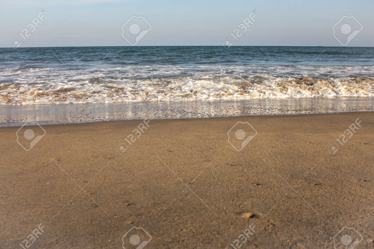 Beautiful view of waves along the beach in coastal town of Mahabalipuram, India - 166460313 Beautiful view of waves along the beach in coastal town of Mahabalipuram, India - 166460313