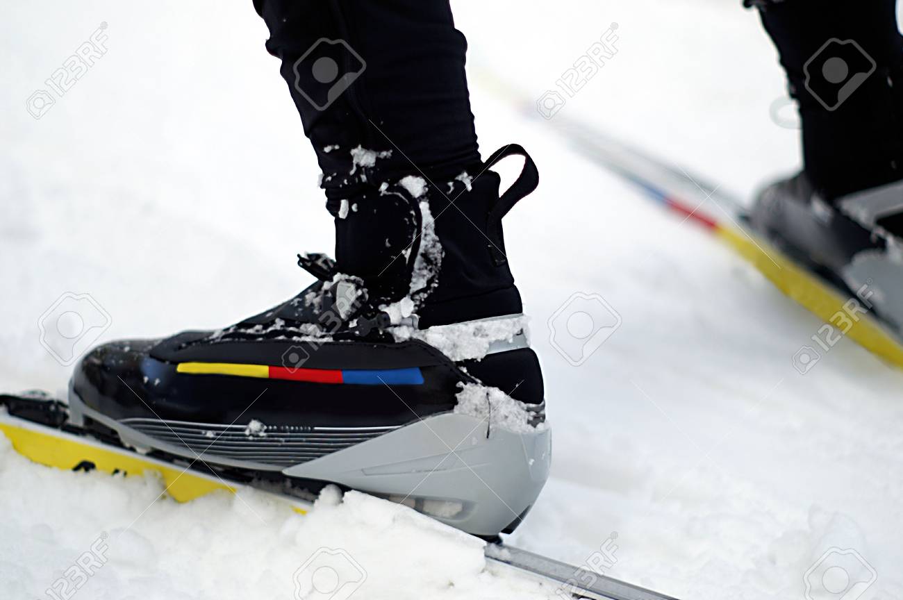 These boots were made for skiing...fast that is. Close up of nordic skating boots, bindings and skis in the snow. - 2651094 These boots were made for skiing...fast that is. Close up of nordic skating boots, bindings and skis in the snow. - 2651094