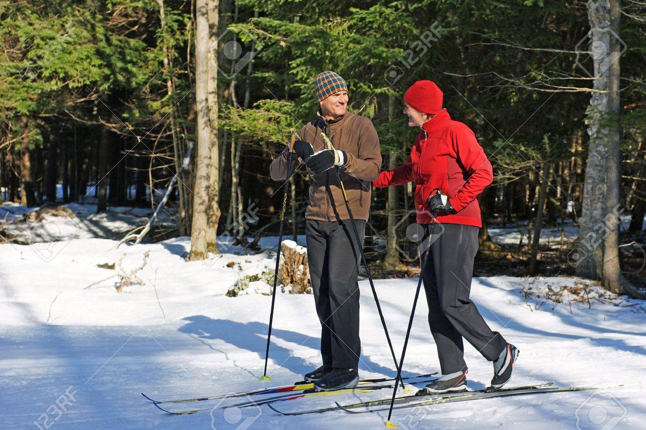 Active baby boomers on nordic skis in Ontario forest - 4346877 Active baby boomers on nordic skis in Ontario forest - 4346877