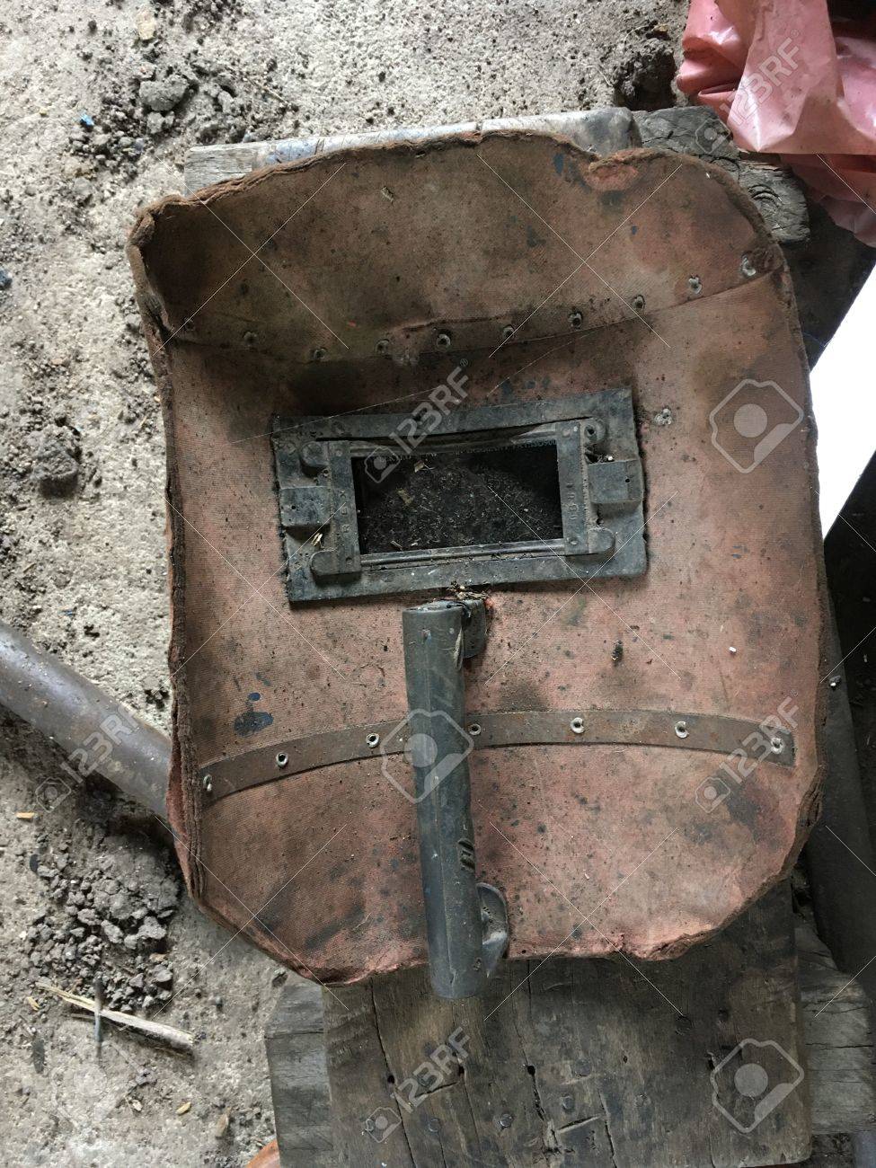 Old Welder Mask On The Floor Stock Photo Picture And Royalty Free Image Image 78067833