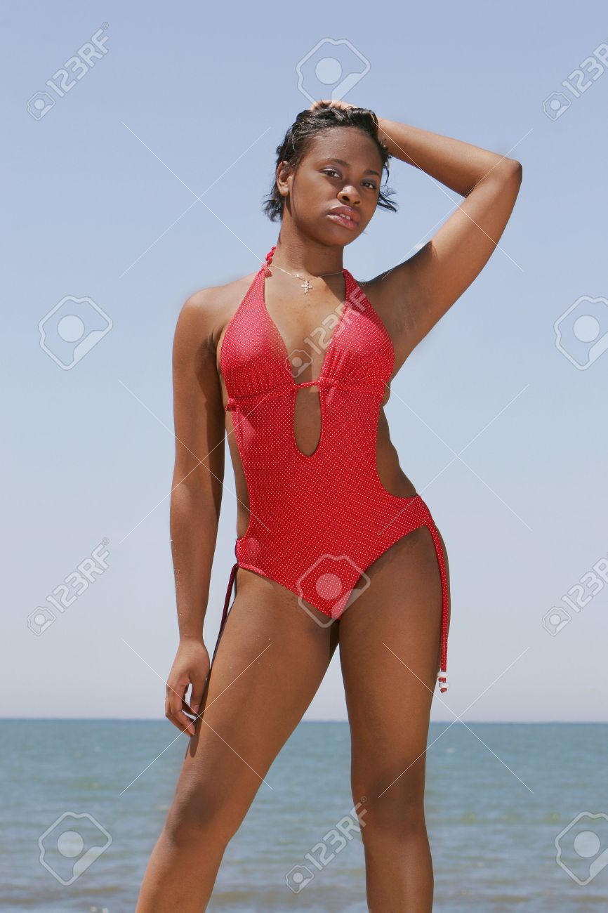 Beautiful African American Woman In A Swimsuit On The Beach Stock Photo,  Picture And Royalty Free Image. Image 3111603.