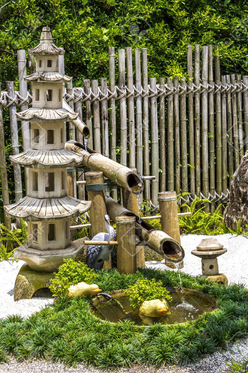 Pagada Stone And Bamboo Fountain In Japanese Garden Stock Photo 22992473 Pagada Stone And Bamboo Fountain In Japanese Garden Stock Photo 22992473