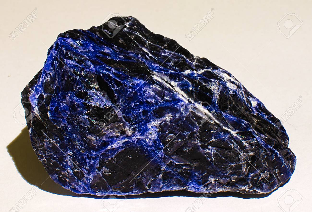 sodalite blue black veined mineral stone stock photo picture and