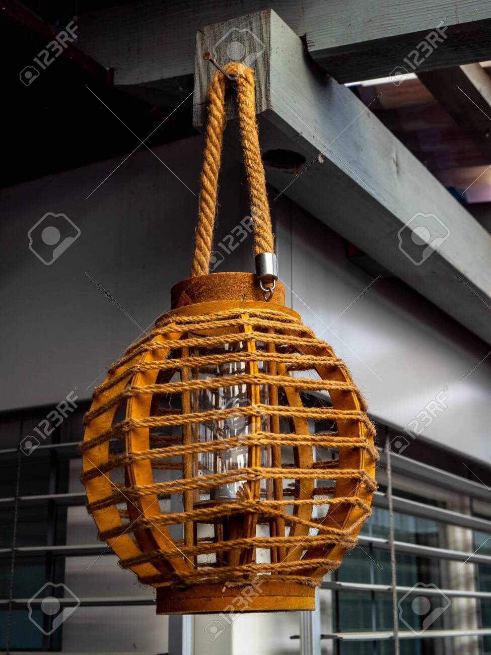 cool outdoor lamp hanging from the roof wood - 120999291 cool outdoor lamp hanging from the roof wood - 120999291