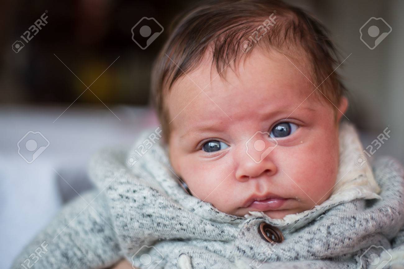 mixed race child with blue eyes