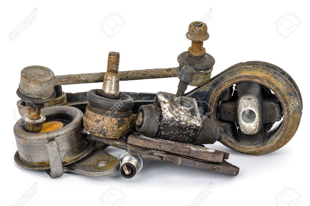 A Few Old, Worn Out And Rusty Car Parts 