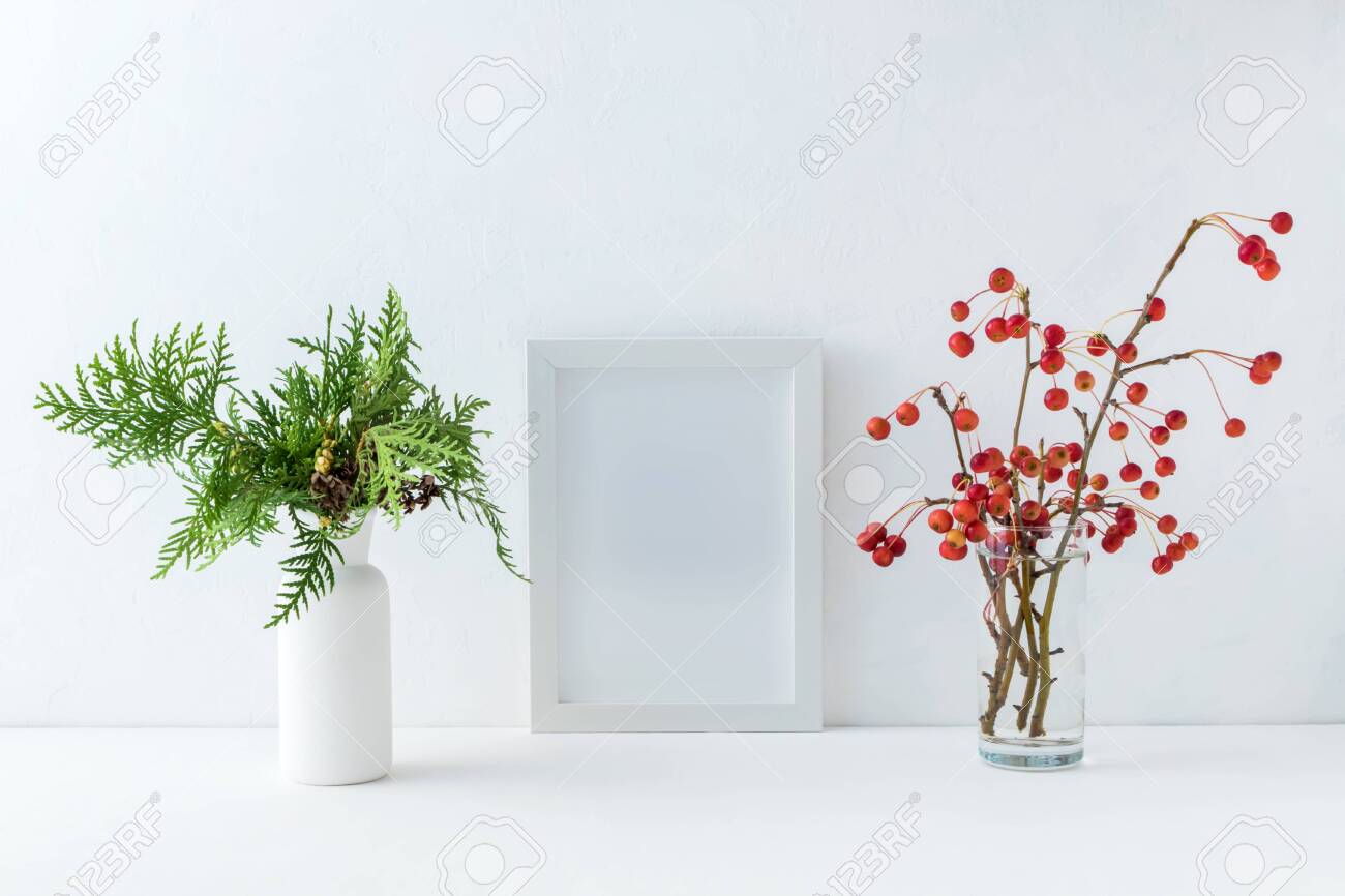 Mockup White Frame And Branches With Small Red Apples In A Vase
