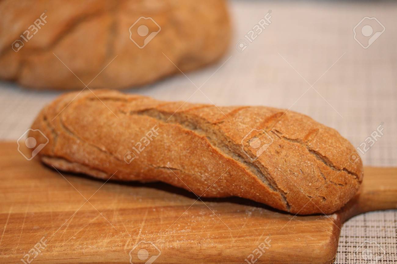 Long French Bread On The Cutting Board