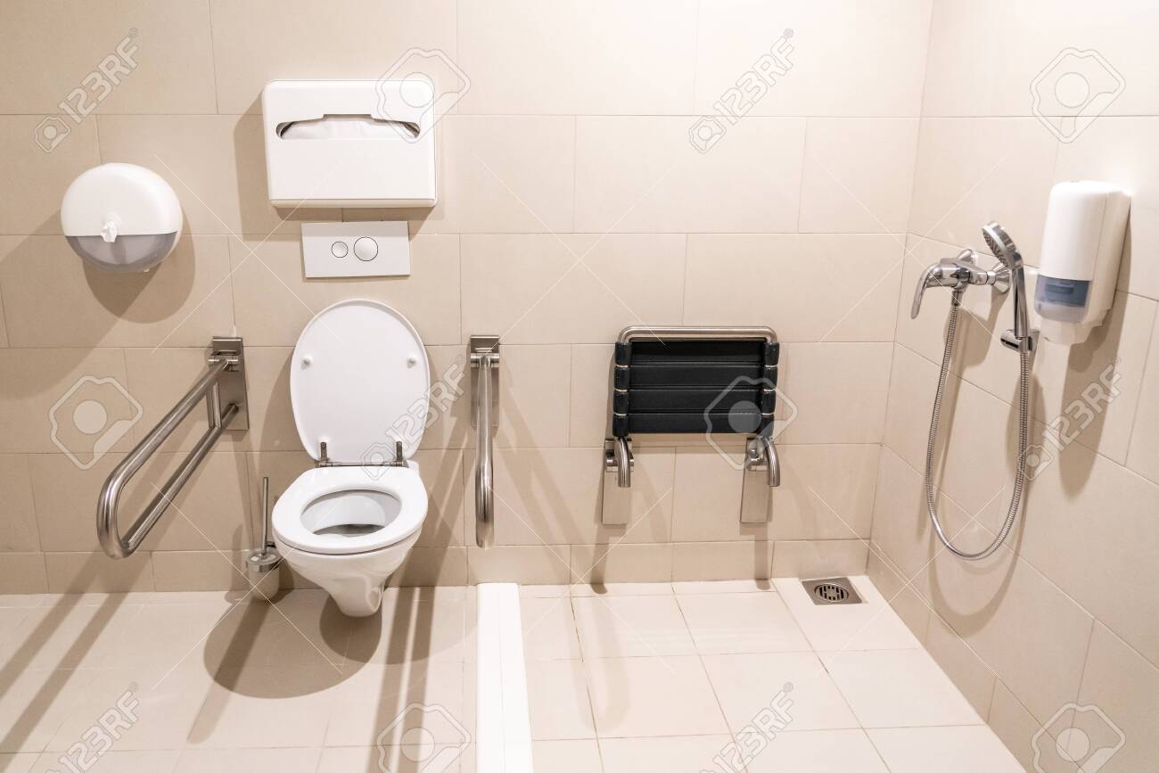 Restroom For Disabled People With Special Equipment Stock Photo