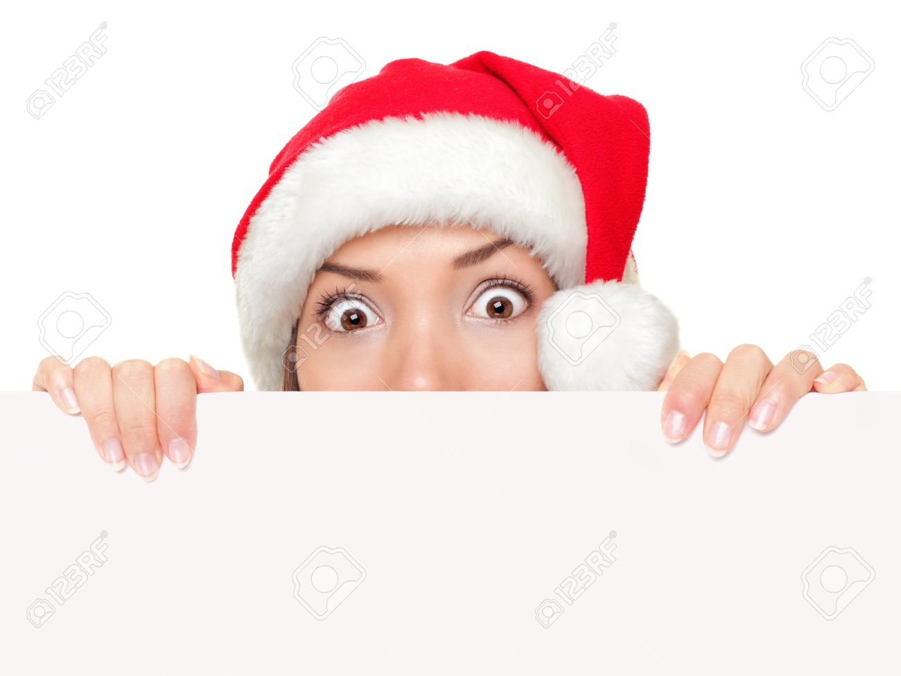 christmas sign woman peeking over empty blank paper sign wearing