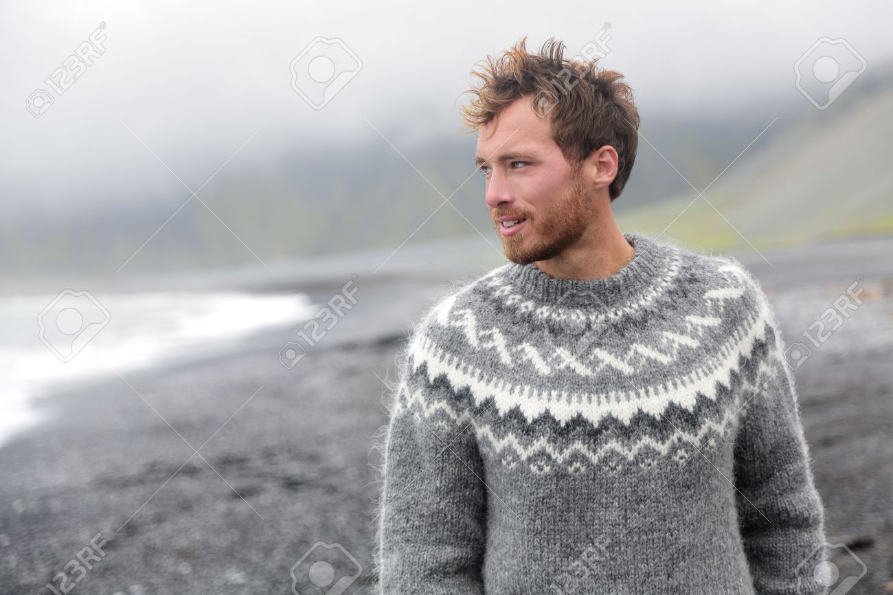 Handsome Man Walking Black Sand Beach On Iceland Wearing Icelandic Sweater.  Good Looking Male Model Looking Pensive At Ocean Sea. Stock Photo, Picture  and Royalty Free Image. Image 32105253.
