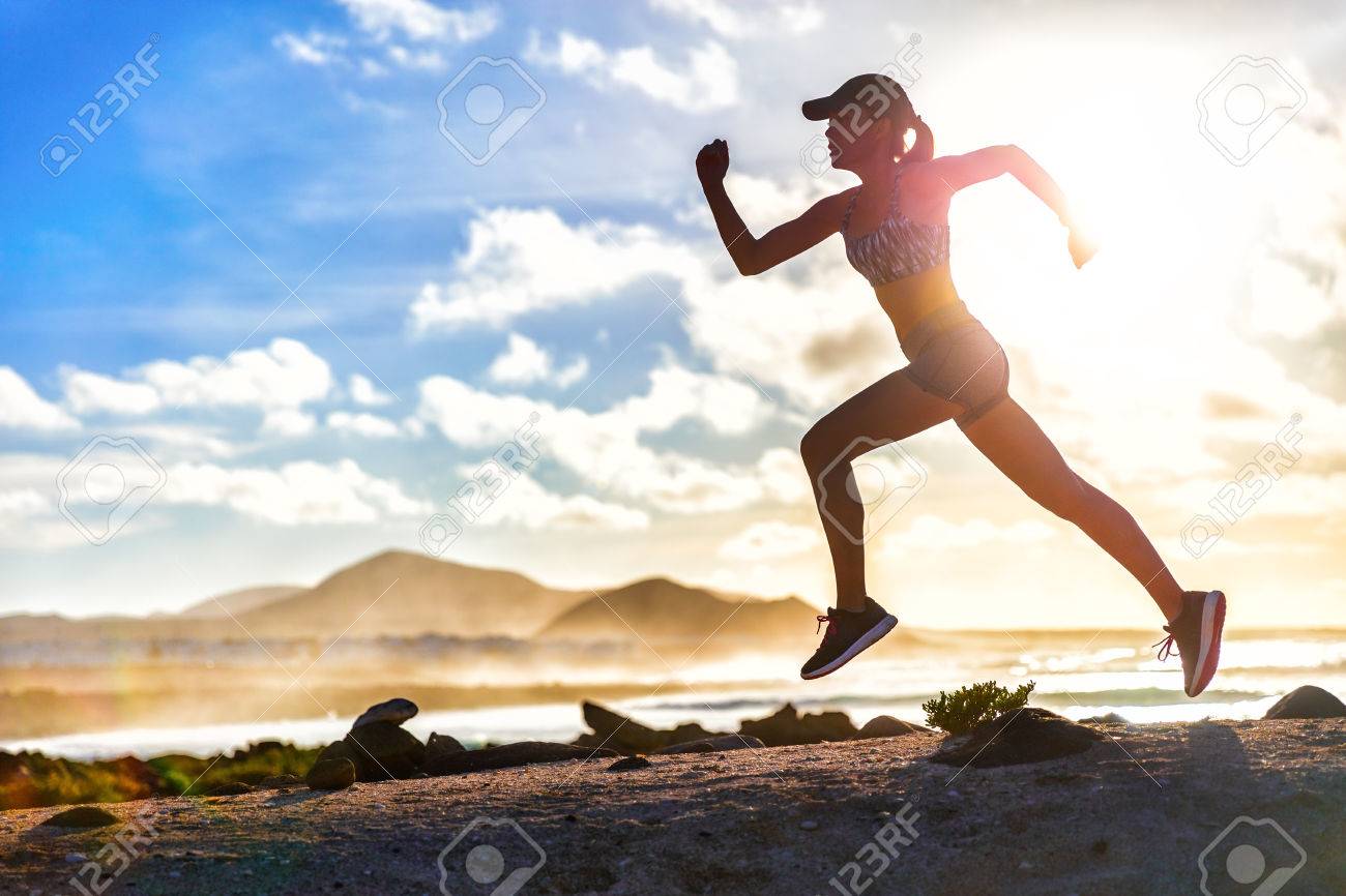 Athlete runner trail running on summer beach. Fit body silhouette of sports Woman in sportswear cap sprinting with energy and motion in outdoors nature training cardio with jogging workout exercise. - 57254459 Athlete runner trail running on summer beach. Fit body silhouette of sports Woman in sportswear cap sprinting with energy and motion in outdoors nature training cardio with jogging workout exercise. - 57254459
