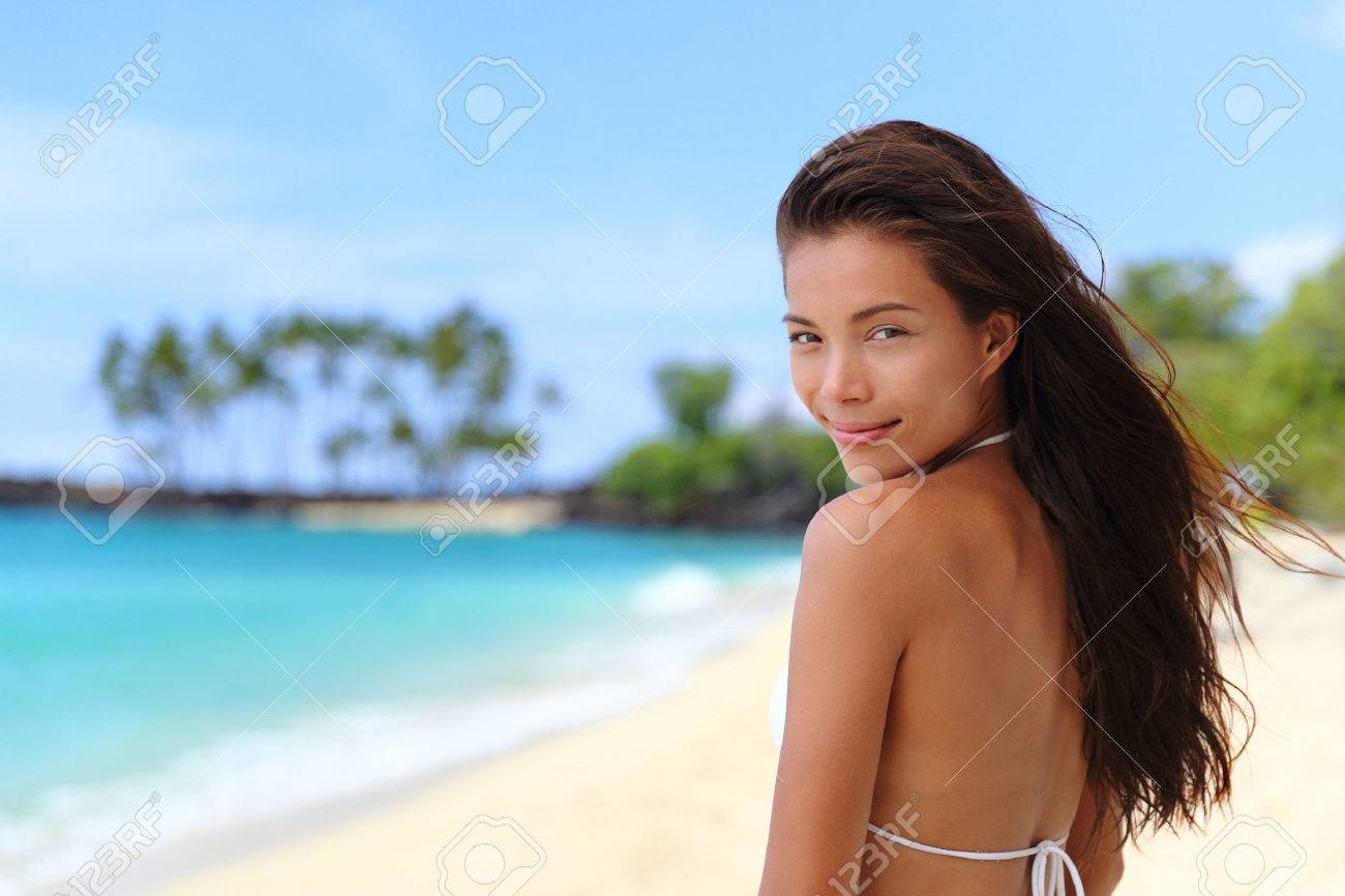 Beautiful Young Asian Model Portrait Bikini Woman Relaxing On Beach Vacation With Sexy Body And Beautiful Young Asian Model Portrait Bikini Woman Relaxing On Beach Vacation With Sexy Body And