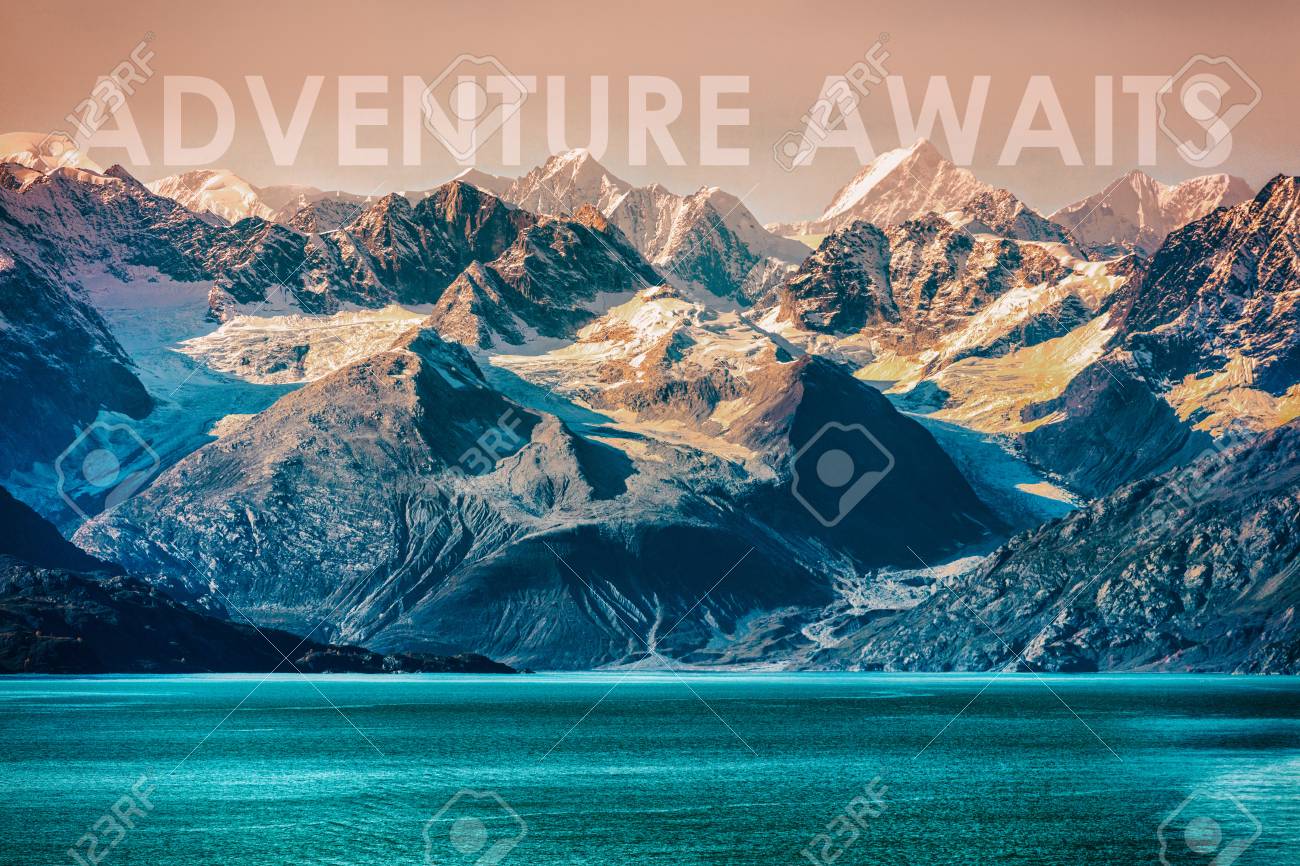 ADVENTURE AWAITS Travel Concept Motivational Quote Written On Nature  Landscape Of Alaska Mountain Range In The Wilderness. Inspirational Quotes  For The Outdoors, Go Travel And Discover. Stock Photo, Picture and Royalty  Free, image size:1300x866