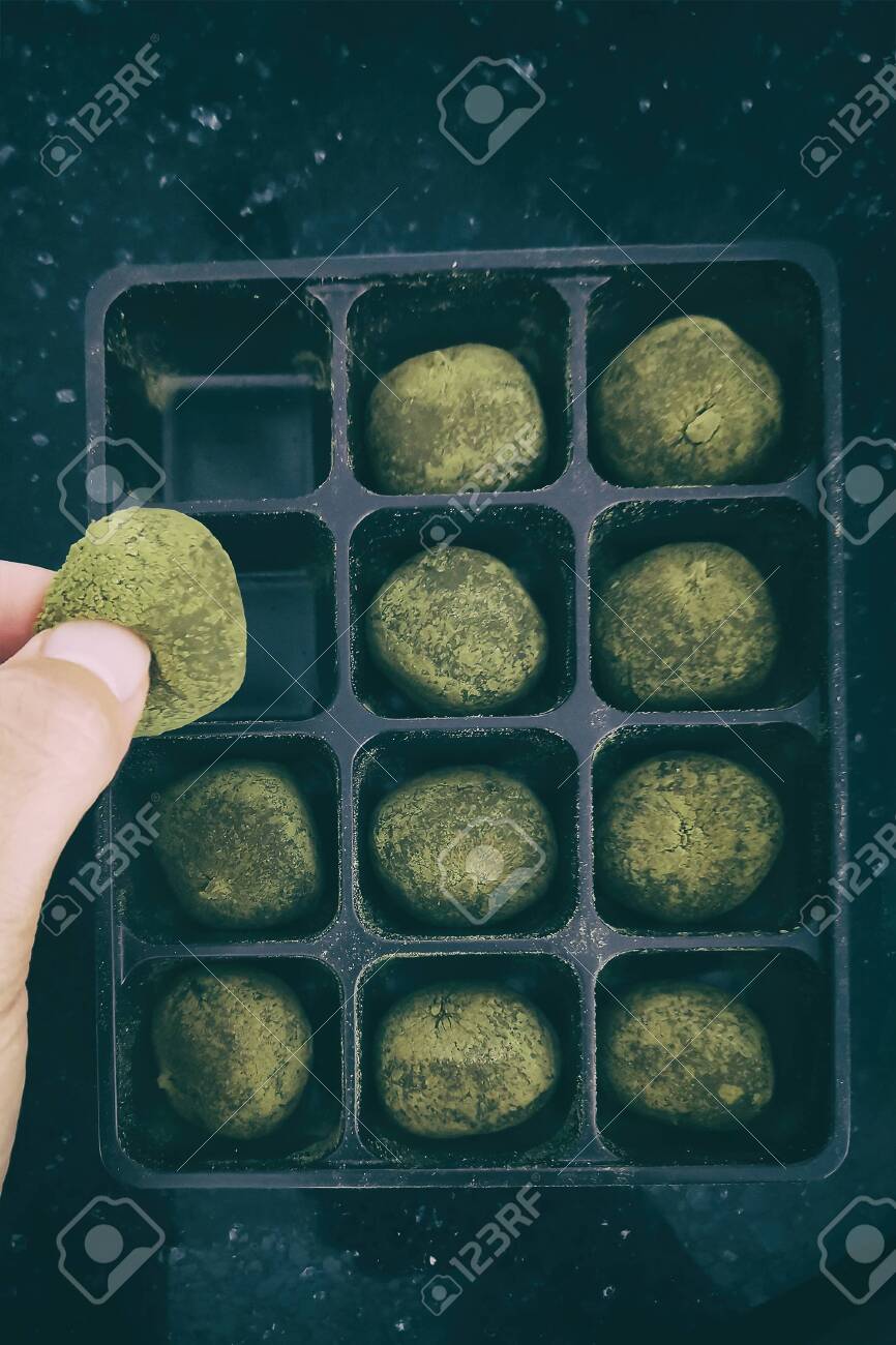 Matcha mochi rice cake balls bakery box from Tokyo, Japan. Local..