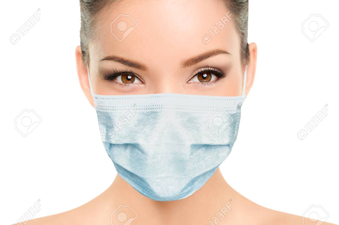 Beautiful Asian woman wearing medical face mask with eyes makeup beauty model portrait isolated on white background for Coronavirus. - 147857375 Beautiful Asian woman wearing medical face mask with eyes makeup beauty model portrait isolated on white background for Coronavirus. - 147857375