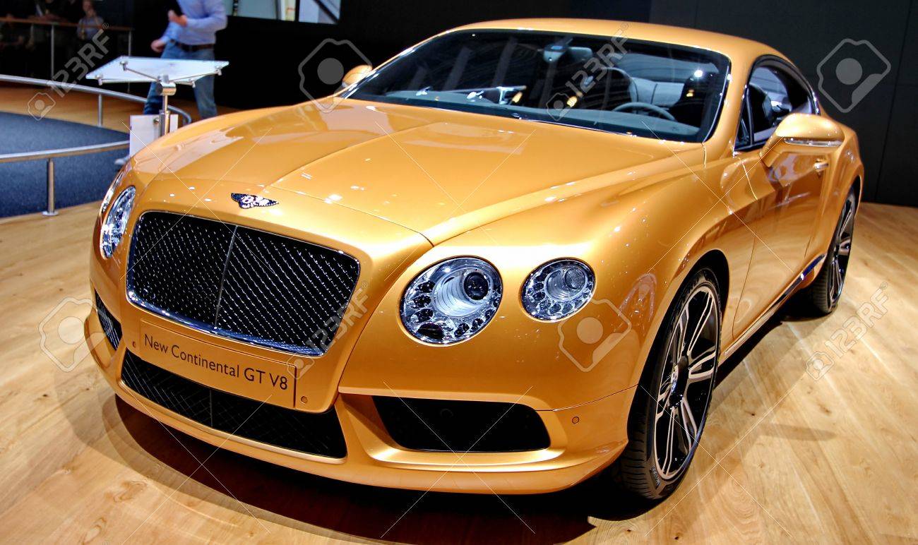 GENEVA MARCH 16 A BENTLEY new continental GT v8 on display at the 82nd international motor show Palexpo-Geneva on march 16;2012 in Geneva - 12818858 GENEVA MARCH 16 A BENTLEY new continental GT v8 on display at the 82nd international motor show Palexpo-Geneva on march 16;2012 in Geneva - 12818858