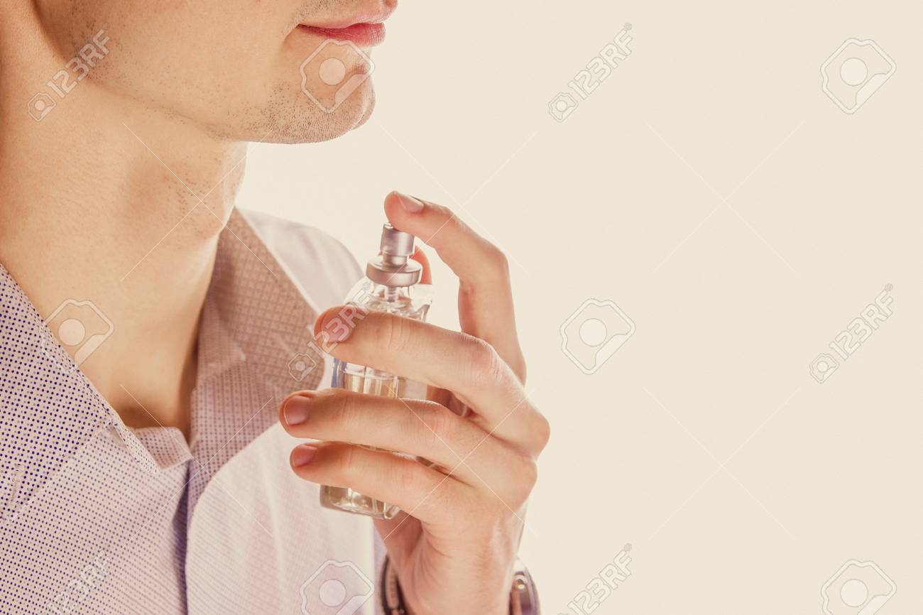 https://previews.123rf.com/images/mariiaboiko/mariiaboiko1808/mariiaboiko180800036/105584792-man-applying-perfume-on-his-neck-on-white-background-guy-sprays-perfume-on-his-body.jpg