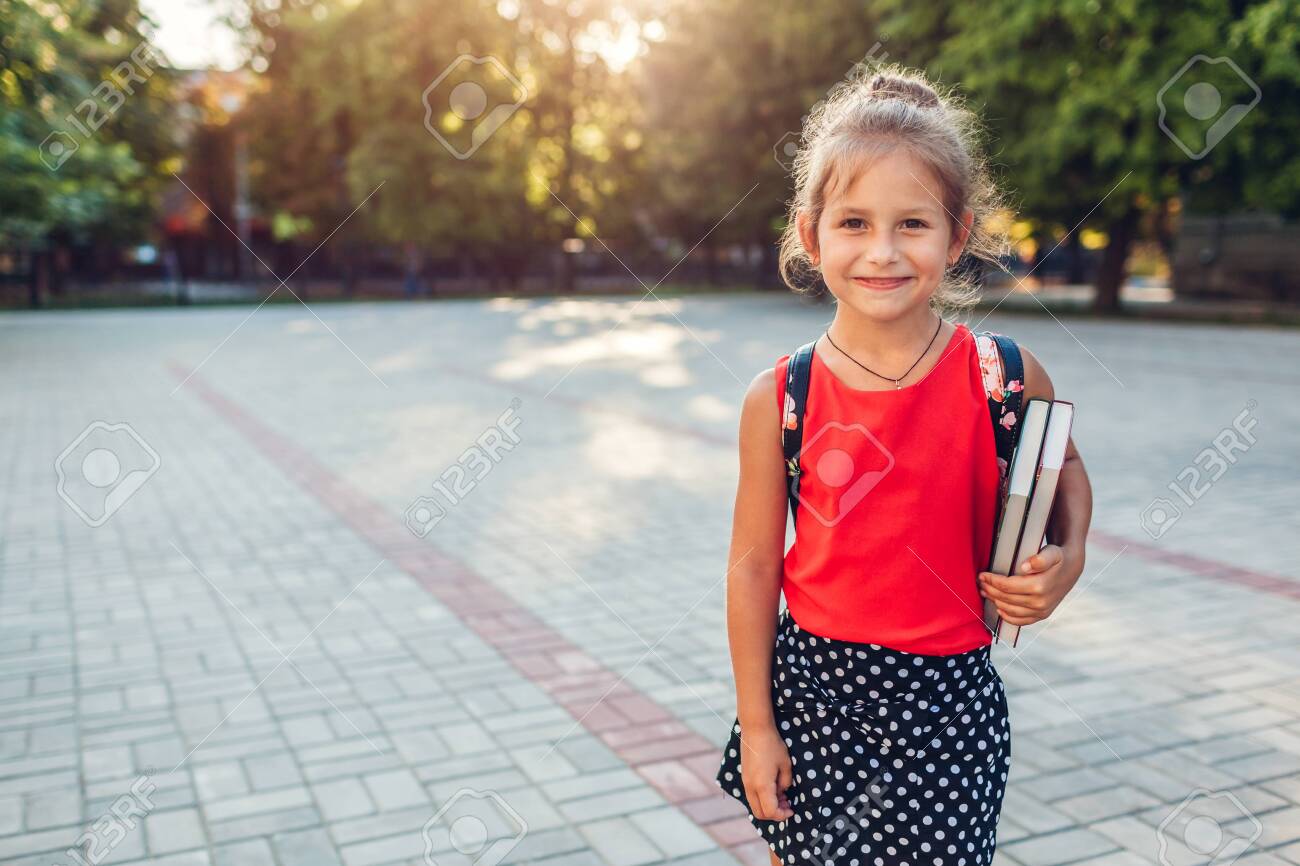 child wearing backpack