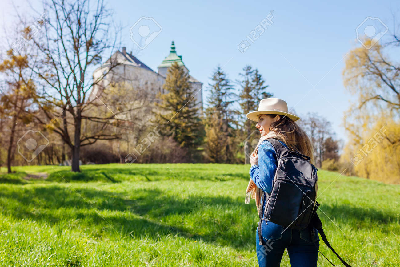 Tourist packpacker walking in Olesko Castle garden. Ancient architecture landmarks in Western Ukraine. Traveling among historic places - 168610430 Tourist packpacker walking in Olesko Castle garden. Ancient architecture landmarks in Western Ukraine. Traveling among historic places - 168610430