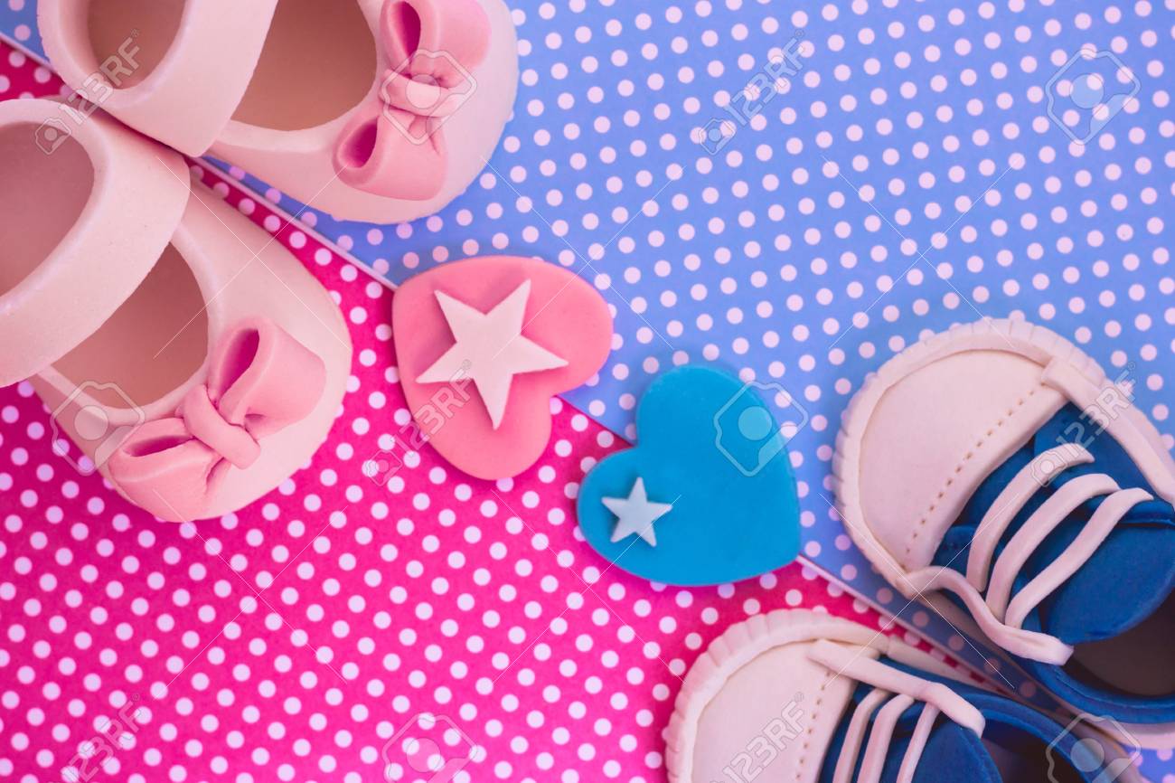 pink and blue baby shoes