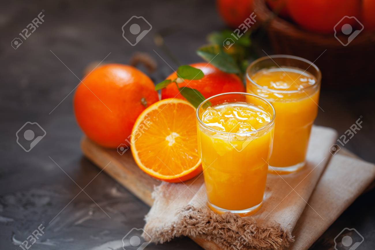 Glass Of Fresh Orange Juice With Pulp On Dark Slate Background Stock Photo Picture And Royalty Free Image Image