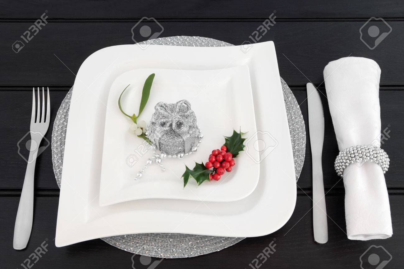 Christmas Dinner Table Setting With White China Plates, Cutlery ... Christmas Dinner Table Setting With White China Plates, Cutlery ...