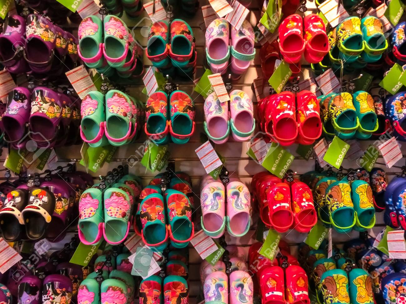 pink and green crocs