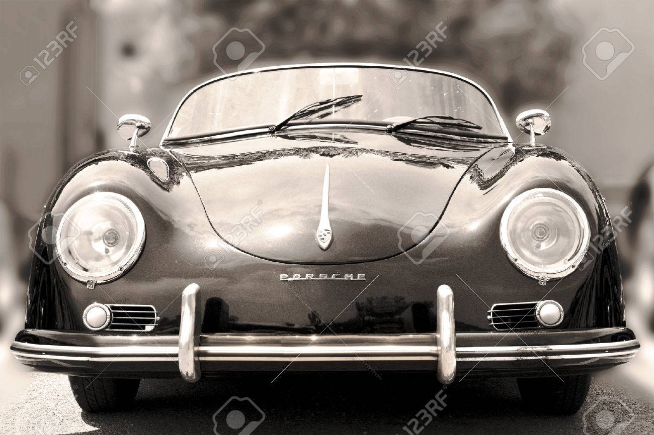 NICE, FRANCE - JUNE 3, 2015: Porsche- luxury vintage sports car at the city street. Retro style - sepia - 53568332 NICE, FRANCE - JUNE 3, 2015: Porsche- luxury vintage sports car at the city street. Retro style - sepia - 53568332