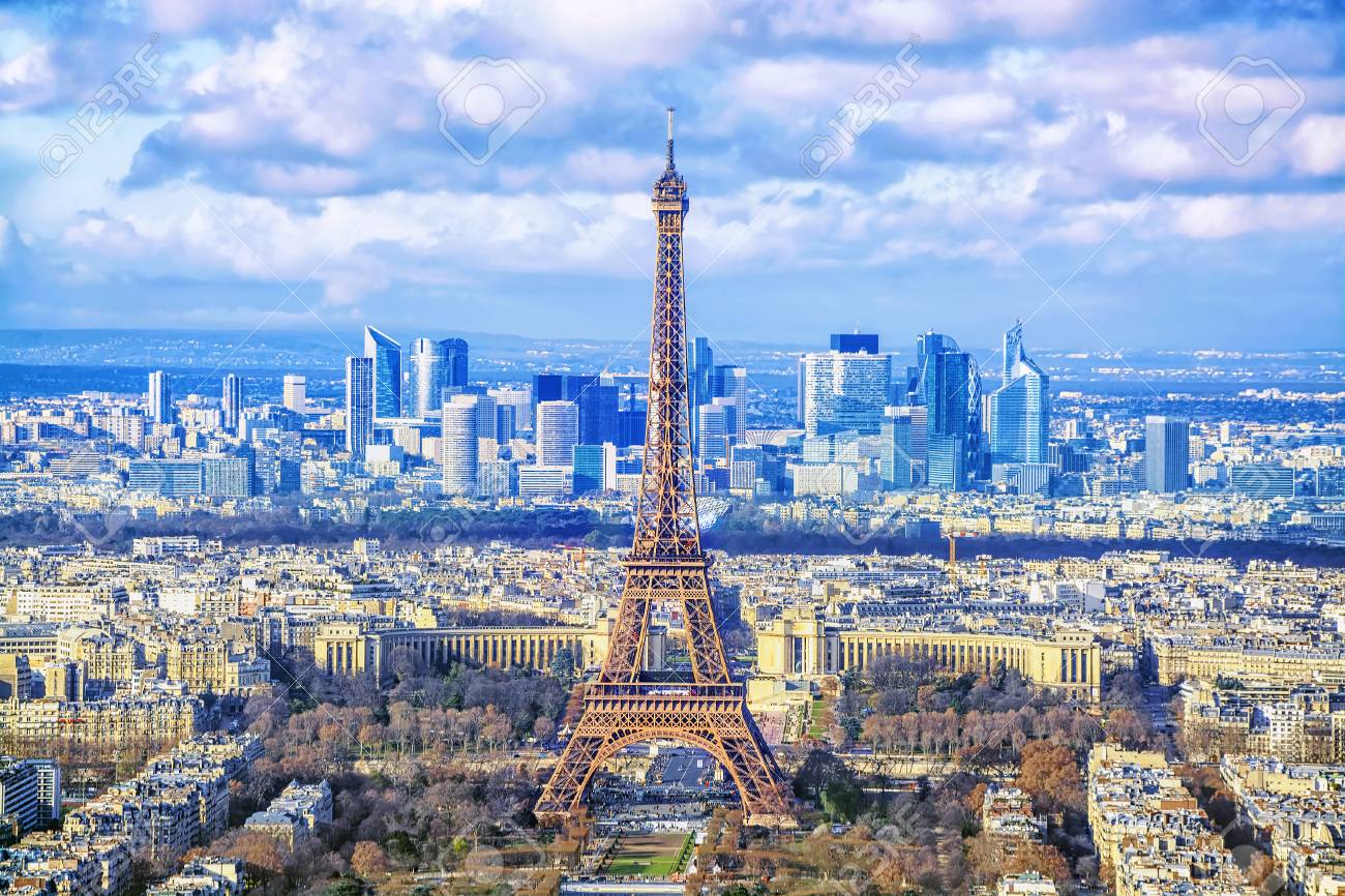 Paris cityscape. Aerial view of the main attractions of Paris Eiffel Tower on background of business district of La Defense, seen from Montparnasse skyscraper, France. - 87149419 Paris cityscape. Aerial view of the main attractions of Paris Eiffel Tower on background of business district of La Defense, seen from Montparnasse skyscraper, France. - 87149419