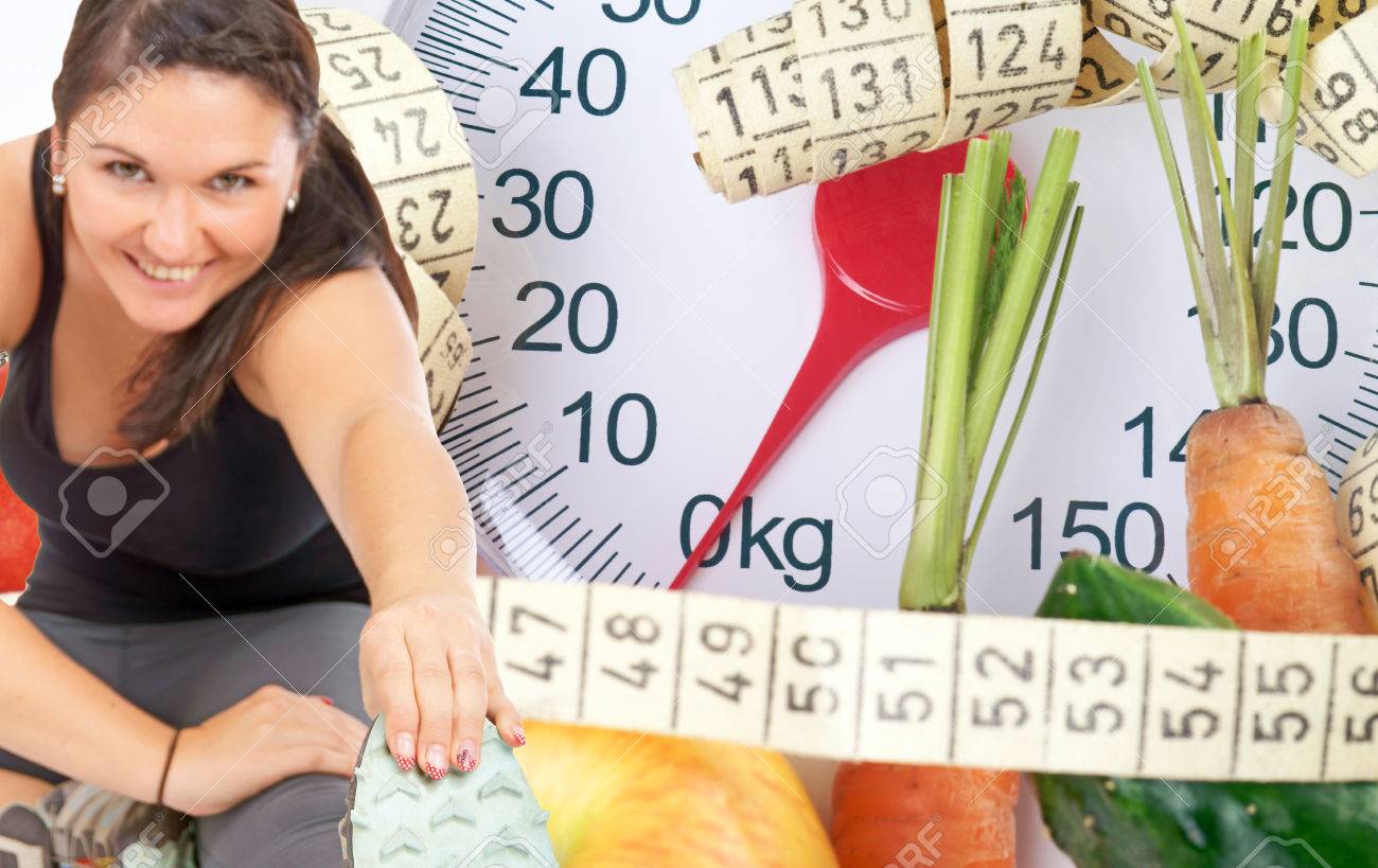 Woman doing sport and body scale with fruits and vegetables - 23146992 Woman doing sport and body scale with fruits and vegetables - 23146992