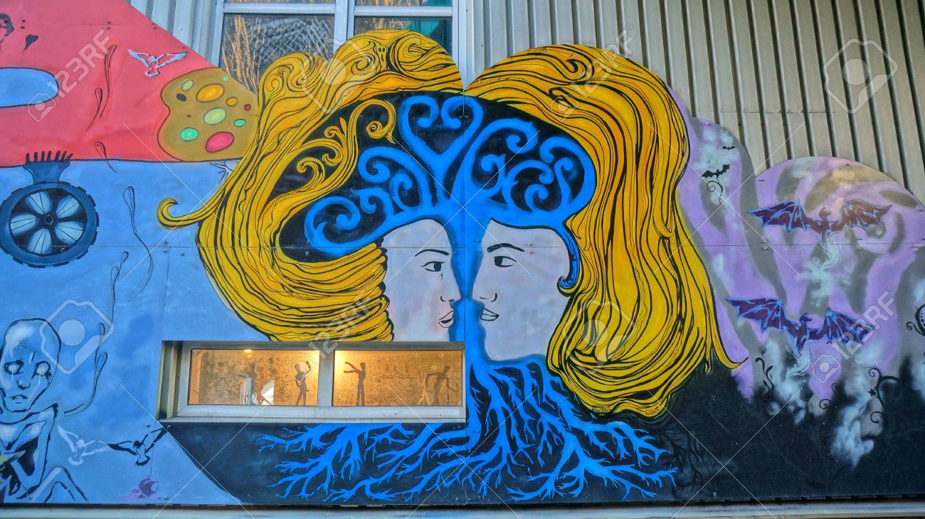 street graffiti and mural on the facade school students norwegian art school in kragero. edvard munch nearby painted his paintings. stock photo, picture and royalty free image. image 37224307. street graffiti and mural
