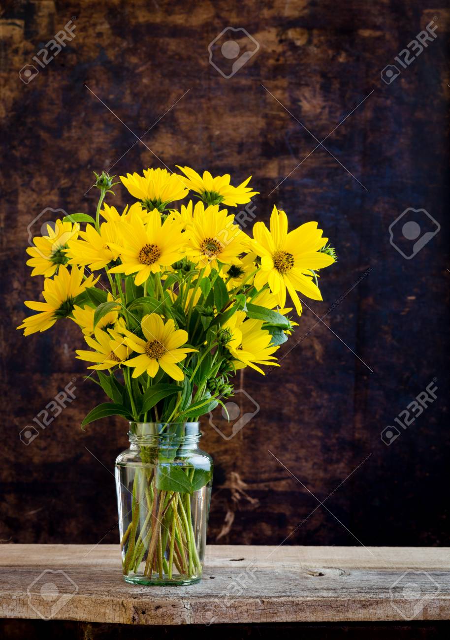 Still Life With Rudbeckia Bright Yellow Flowers Bouquet In Glass