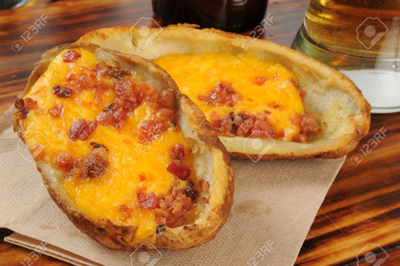Closeup Of Potato Skins With Cheddar Cheese And Bacon Bits And Stock Photo Picture And Royalty Free Image Image