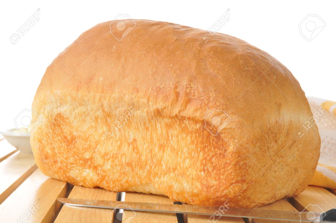A Loaf Of Fresh Baked Bread On A Cooling Rack Stock Photo Picture And Royalty Free Image Image 24870473