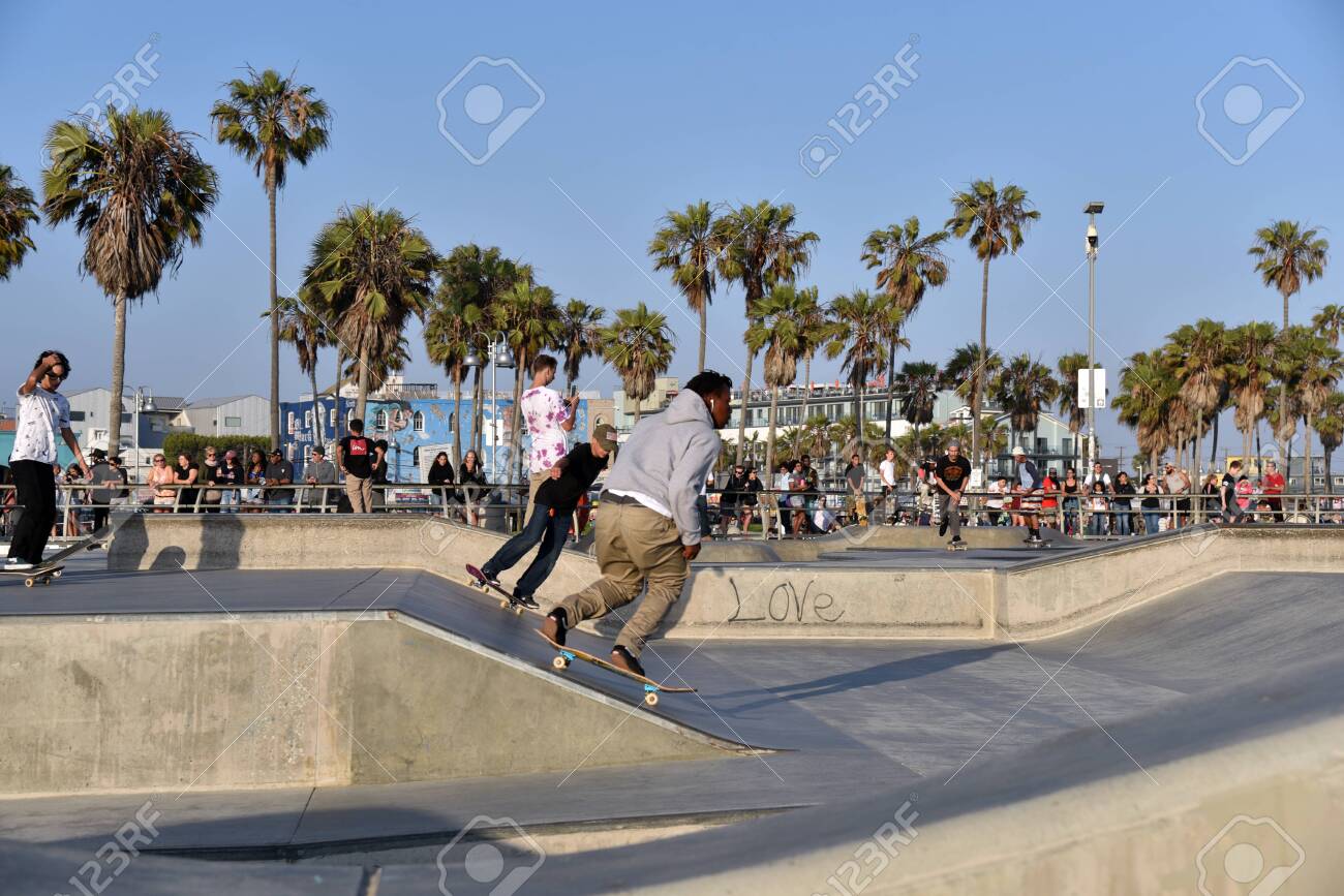VENICE, CA/USA - July 5, 2019: Skateboarders at the famous Venice Beach Skate Park - 136576044 VENICE, CA/USA - July 5, 2019: Skateboarders at the famous Venice Beach Skate Park - 136576044