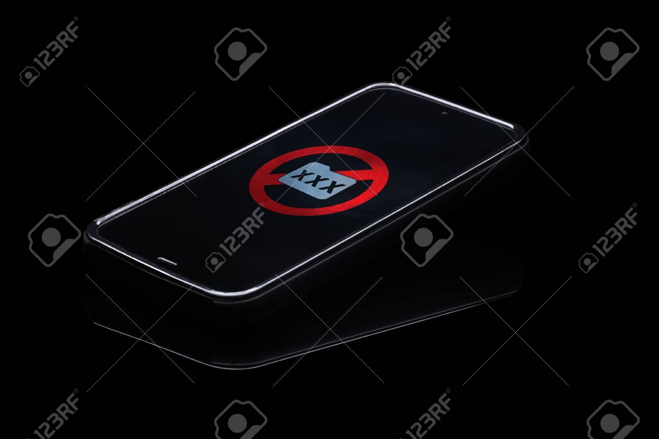 Internet Porn Addiction. Mobile Phone Isolated On Black Background With  Pornography Icon On Touchscreen. Stock Photo, Picture and Royalty Free  Image. Image 91804608.