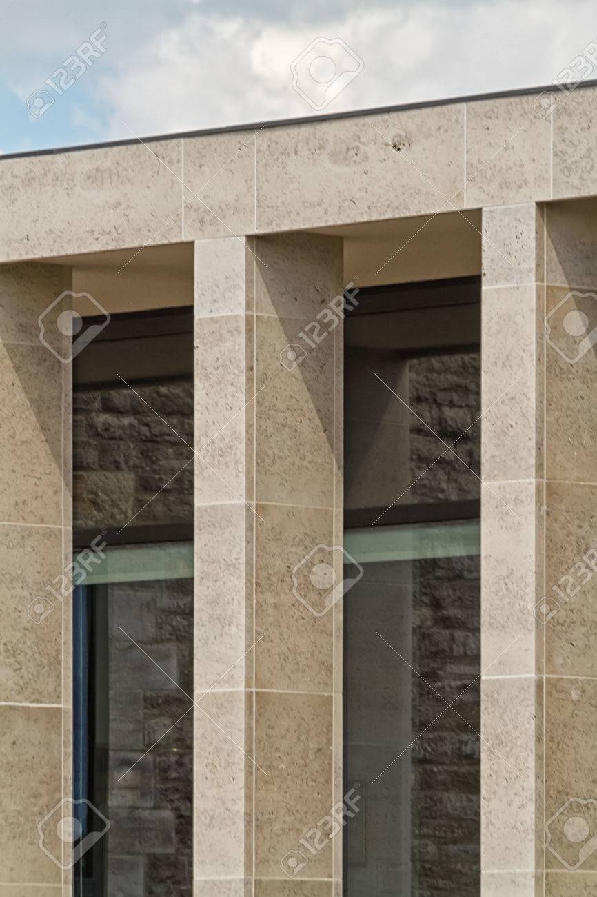 building facade with elegant birttish portland stone columns stone columns