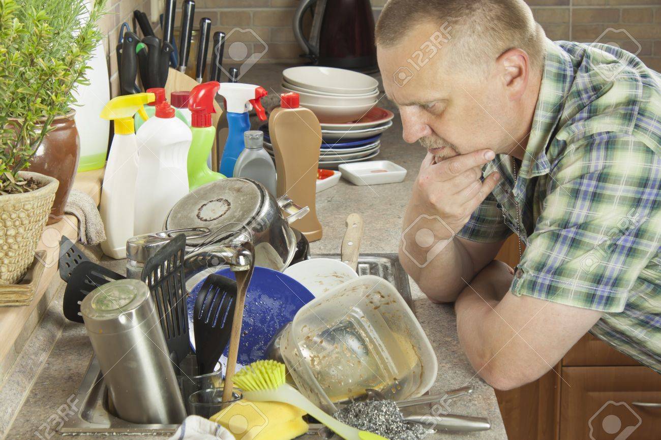 Kitchen Sink With Clean Dishes man washing dirty dishes in the kitchen sink. domestic cleaning Kitchen Sink With Clean Dishes man washing dirty dishes in the kitchen sink. domestic cleaning
