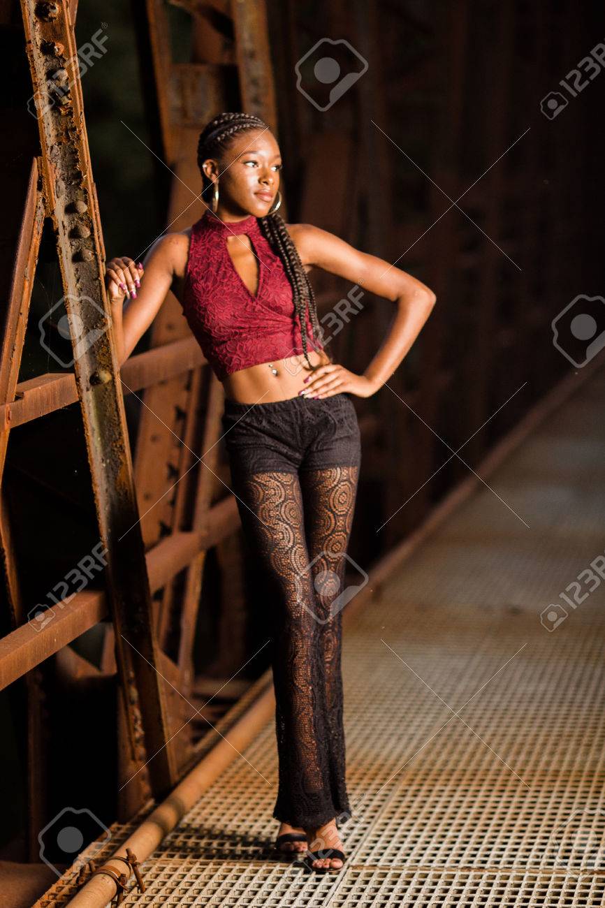 One African American Girl Poses For Her Senior Portraits. Teen Fashion.  Teenage Model. Stock Photo, Picture and Royalty Free Image. Image 69105887.