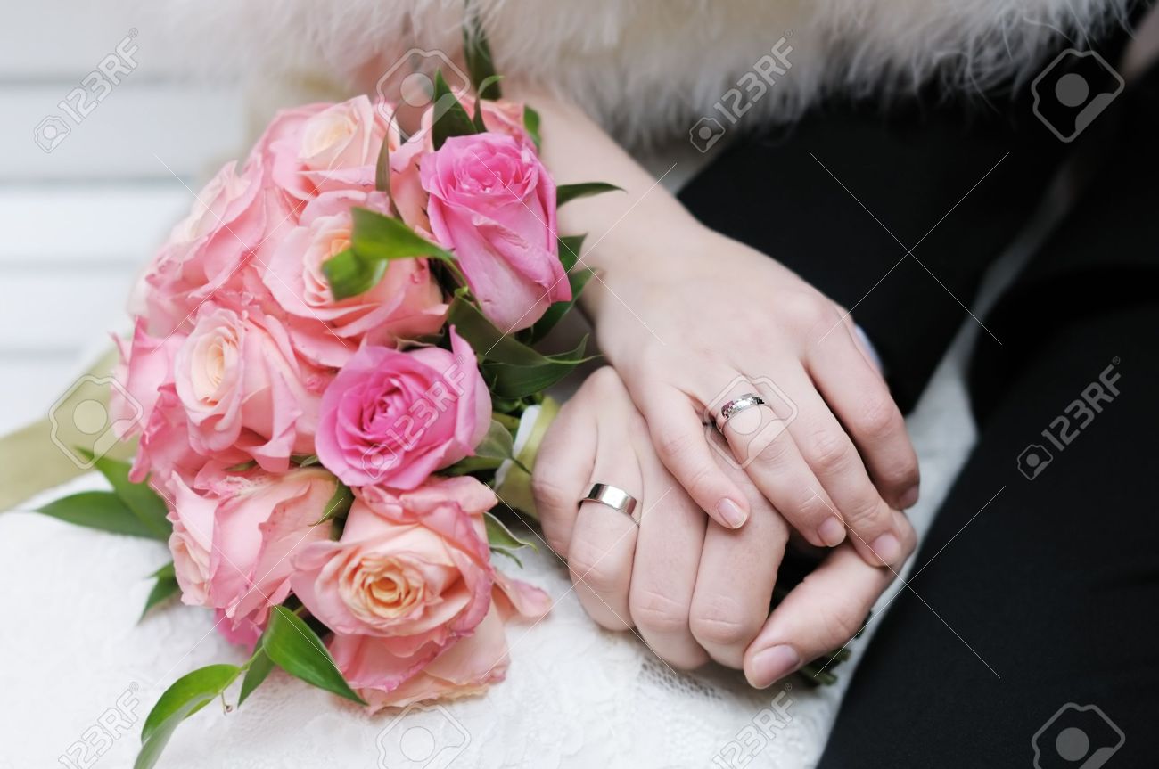 Bride and groom s hands with wedding rings - 13892237 Bride and groom s hands with wedding rings - 13892237