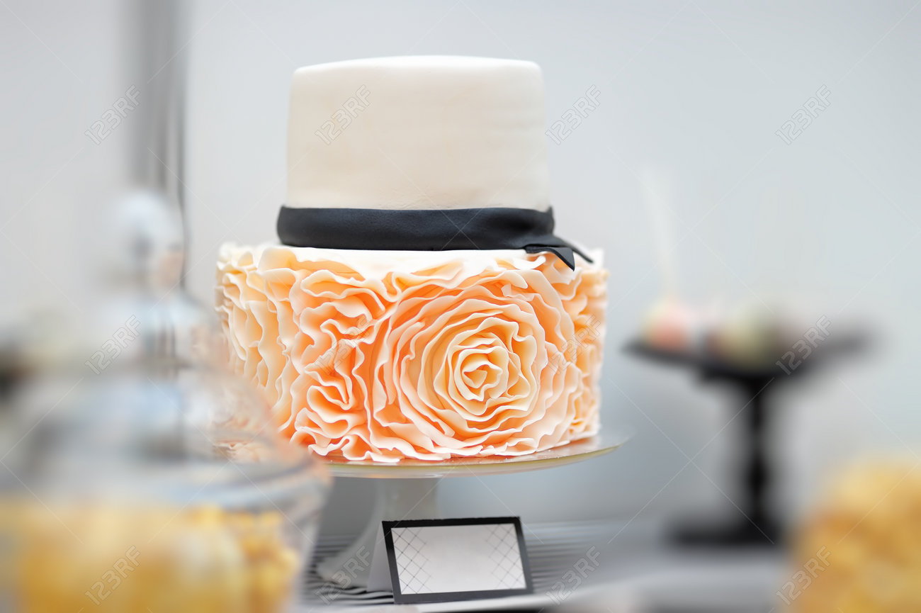 Delicious white wedding cake decorated with cream roses - 37616314 Delicious white wedding cake decorated with cream roses - 37616314