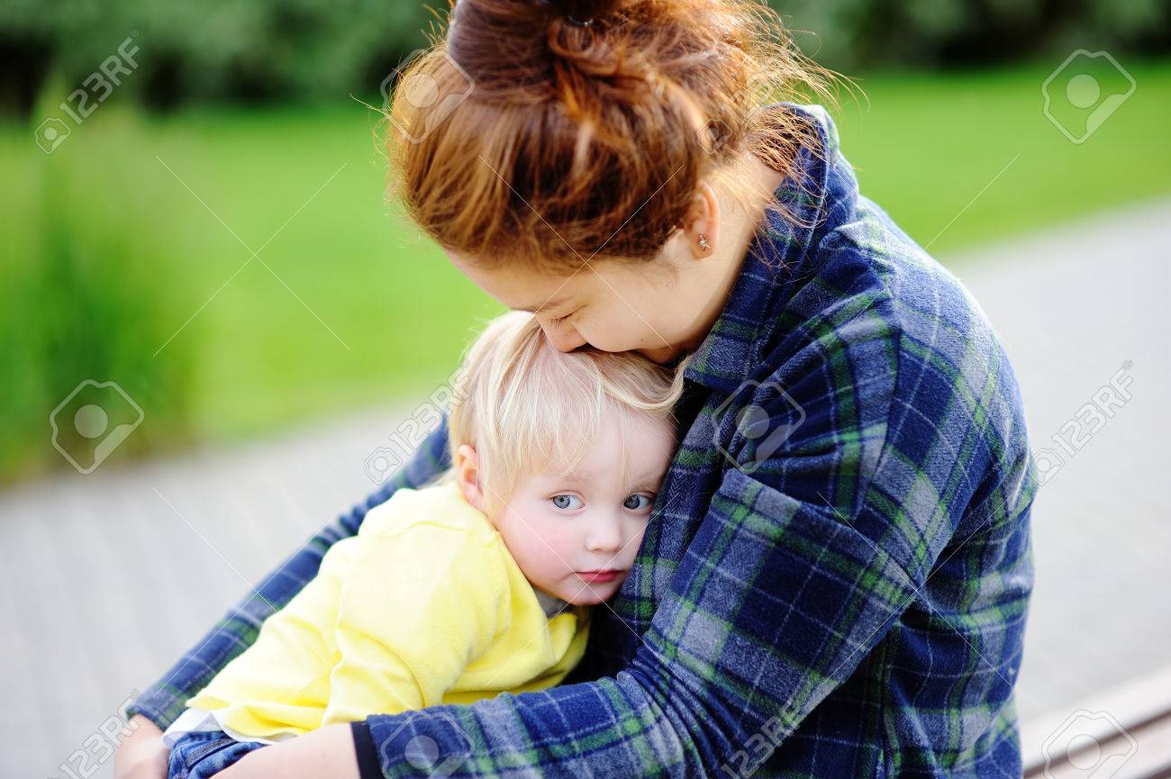 Young asian woman with cute caucasian toddler boy. Babysitting concept - 66155272 Young asian woman with cute caucasian toddler boy. Babysitting concept - 66155272