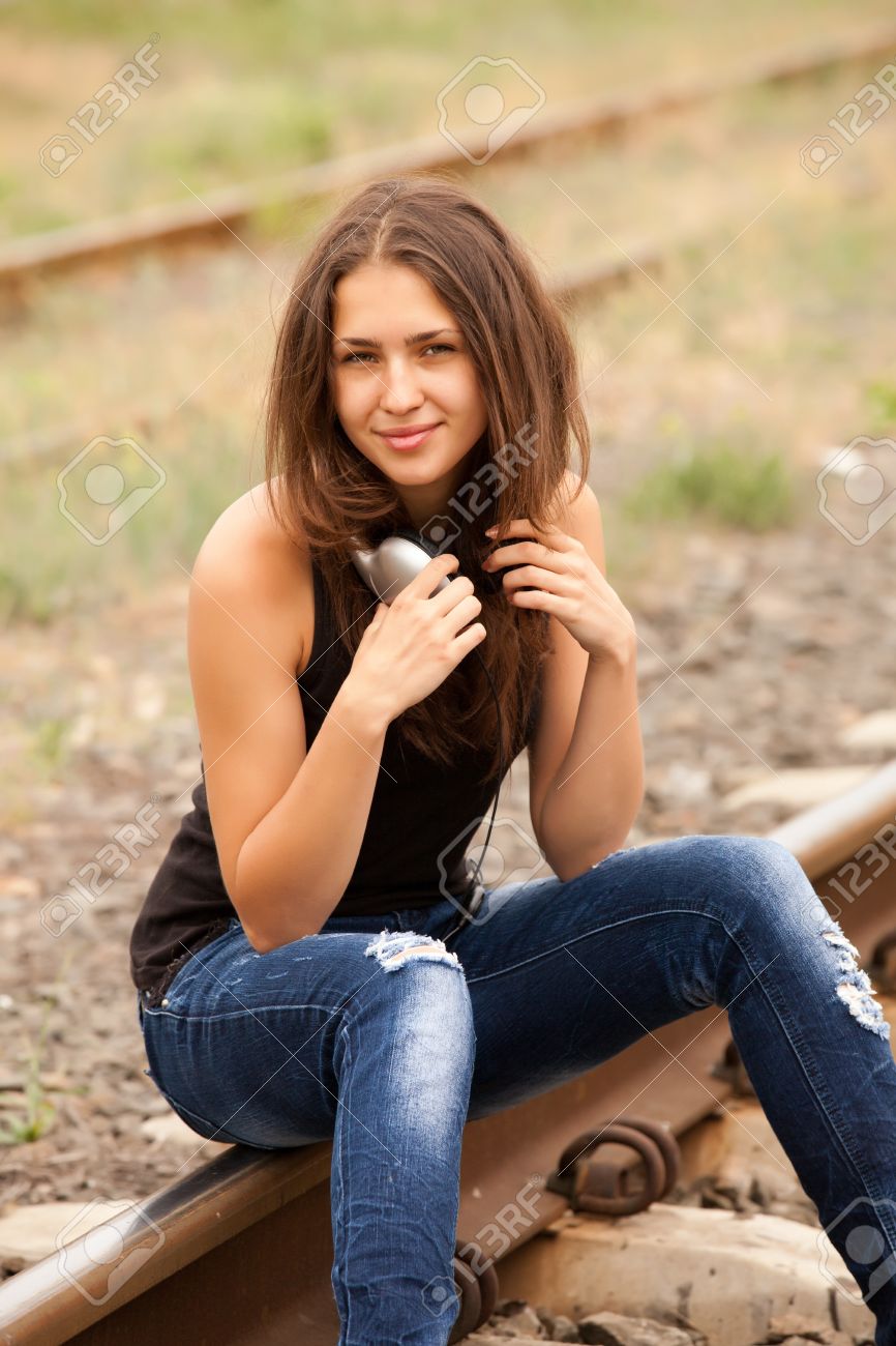 Stock Photo Teen Girl With Headphones At Railways Stock Photo Teen Girl With Headphones At Railways