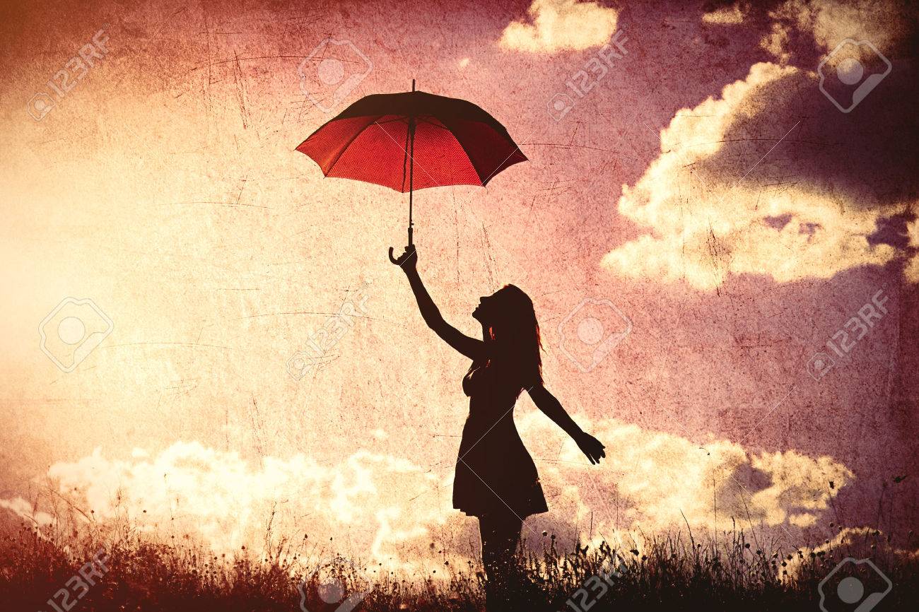 Silhouette of young women with umbrella on sky background - 45604649 Silhouette of young women with umbrella on sky background - 45604649