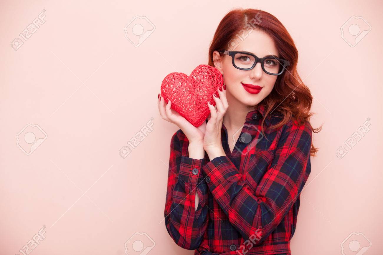 Portrait of a young caucasian girl with gift on pink background. - 46650078 Portrait of a young caucasian girl with gift on pink background. - 46650078
