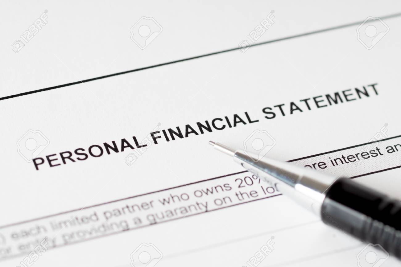 personal financial statement form with black pencil stock photo